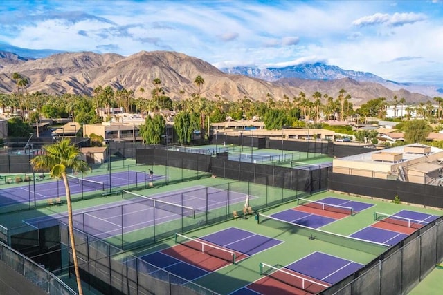 view of sport court with a mountain view