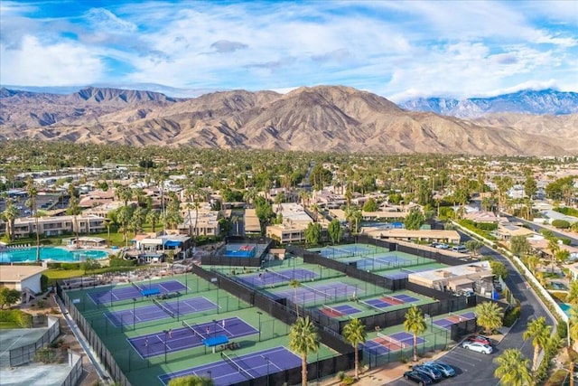 birds eye view of property featuring a mountain view