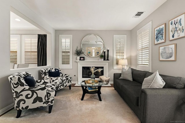 living room with light colored carpet