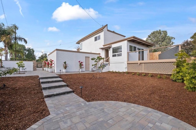 rear view of house featuring a patio area