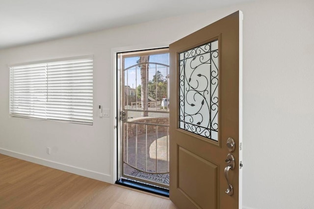 entryway with light hardwood / wood-style flooring