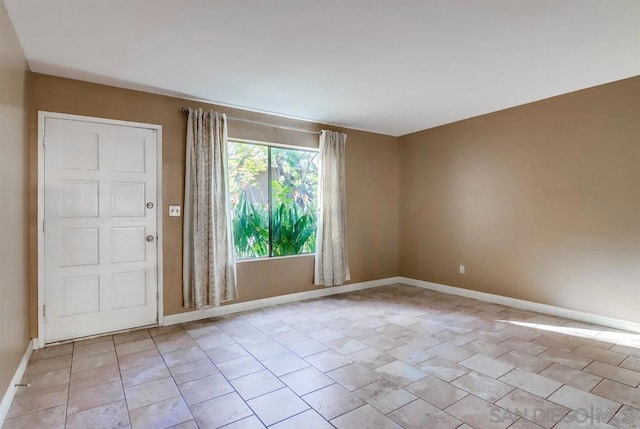 view of tiled spare room