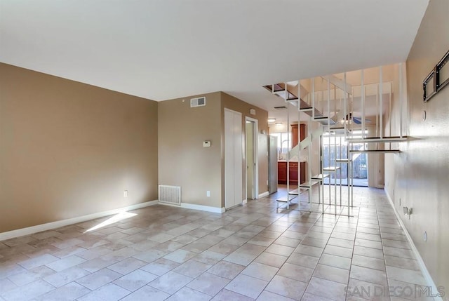 empty room featuring light tile patterned flooring