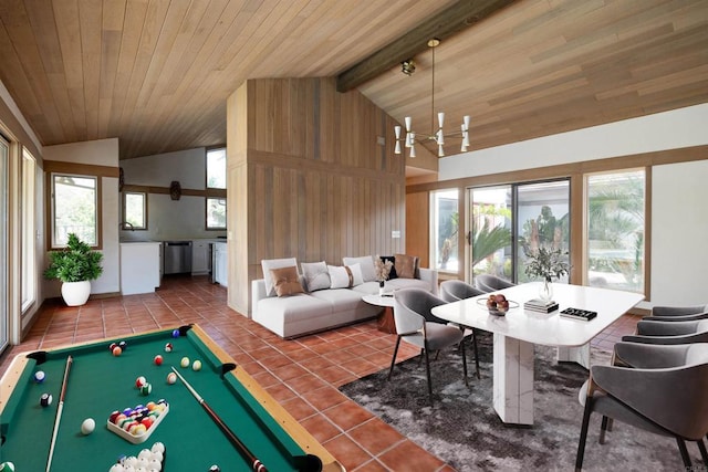 recreation room with wood ceiling, beam ceiling, a wealth of natural light, pool table, and a chandelier