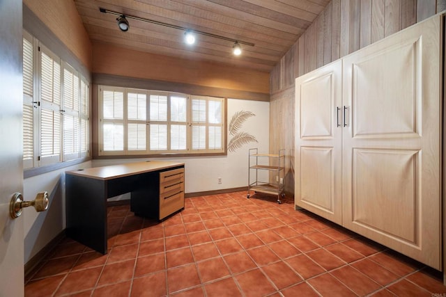 tiled home office with wood ceiling and rail lighting