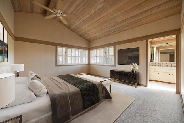 bedroom with light carpet, connected bathroom, wooden ceiling, and ceiling fan