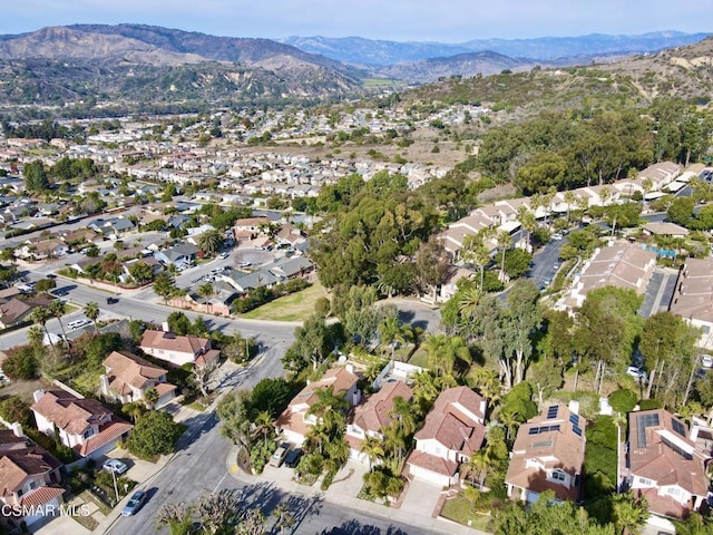 drone / aerial view featuring a mountain view