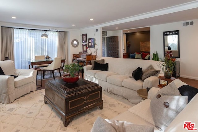 living room with crown molding