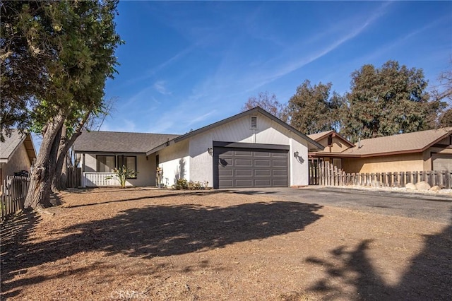 ranch-style home with a garage