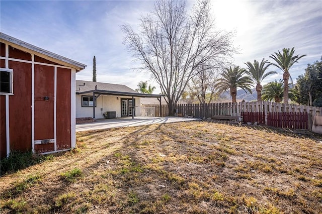 view of yard with a patio area and cooling unit