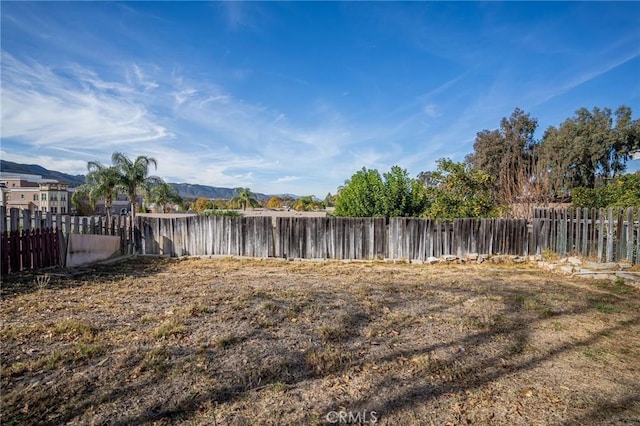 view of yard with a mountain view