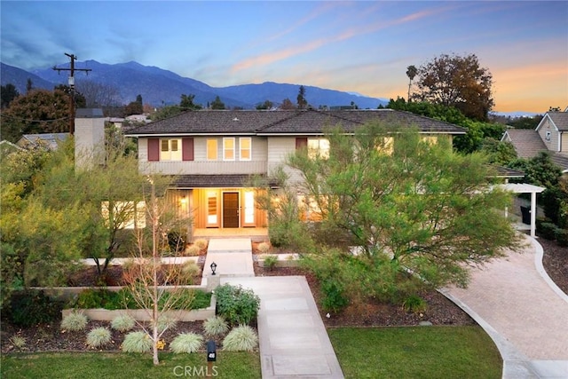 view of front facade featuring a mountain view