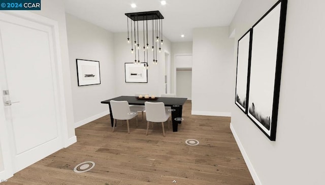 dining space featuring hardwood / wood-style floors