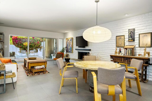 dining area with a fireplace