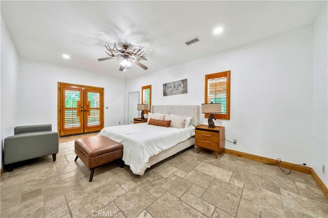 bedroom with ceiling fan, access to exterior, french doors, and multiple windows