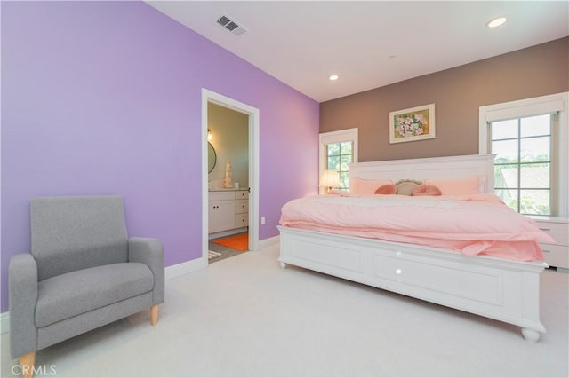 bedroom featuring recessed lighting, visible vents, light carpet, and baseboards