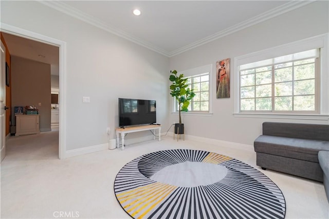 carpeted living room with ornamental molding, recessed lighting, and baseboards