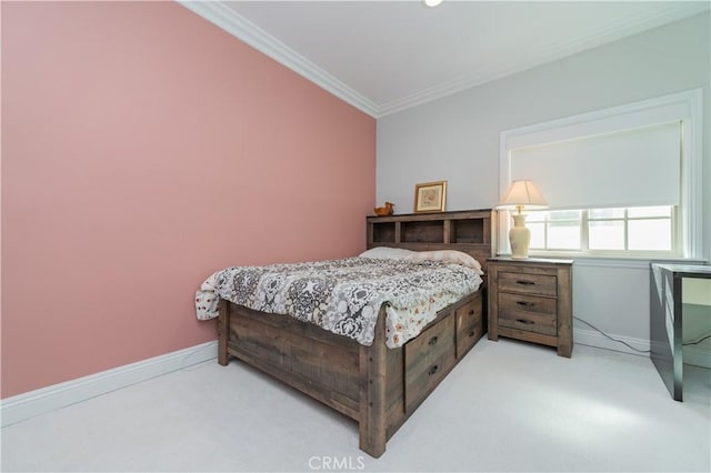 bedroom featuring light carpet, baseboards, and crown molding