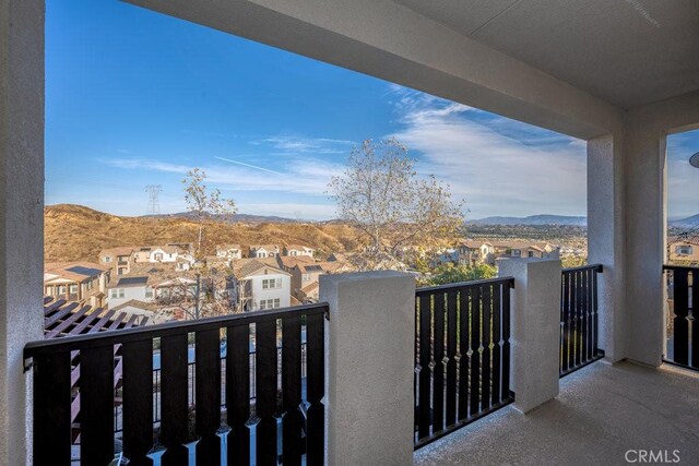 balcony featuring a mountain view