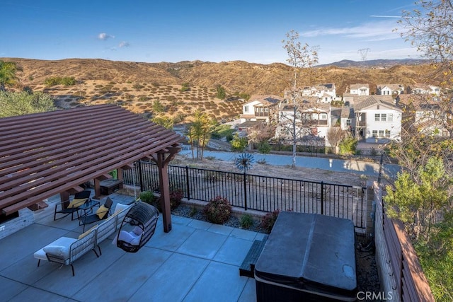 view of patio / terrace featuring grilling area and a mountain view