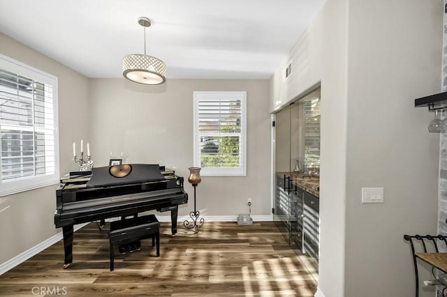 misc room with dark wood-type flooring