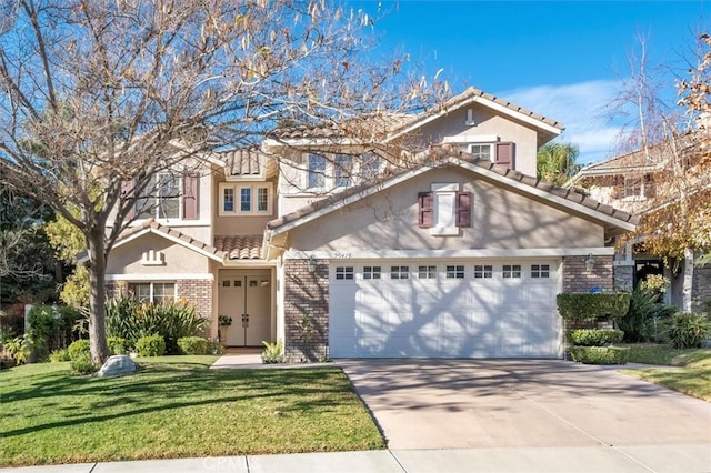 view of front of house with a front lawn and a garage