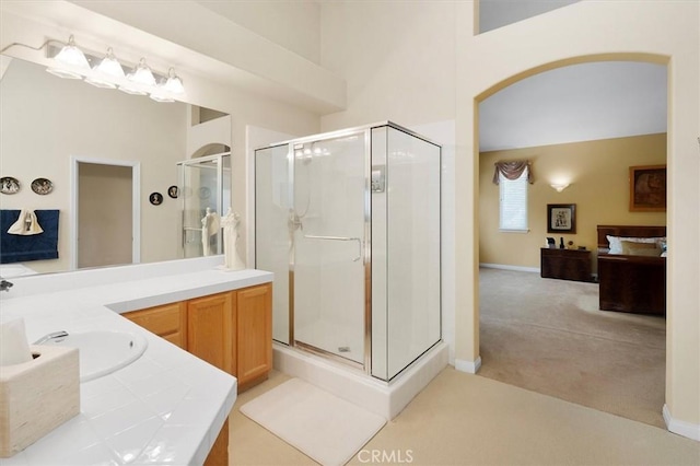 bathroom with vanity and walk in shower