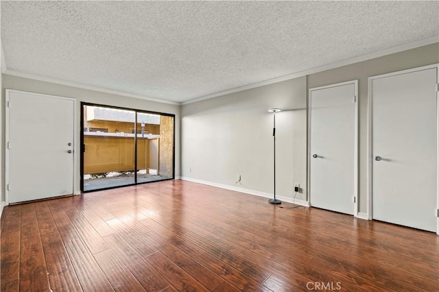 interior space with ornamental molding, wood-type flooring, and a textured ceiling