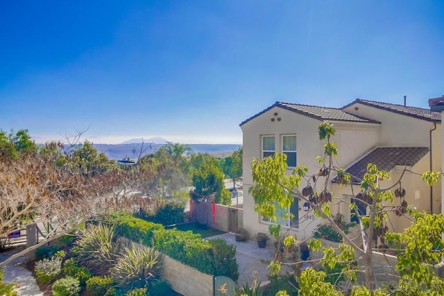 view of home's exterior featuring a mountain view