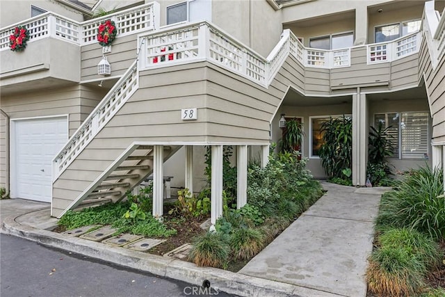 view of exterior entry featuring a garage