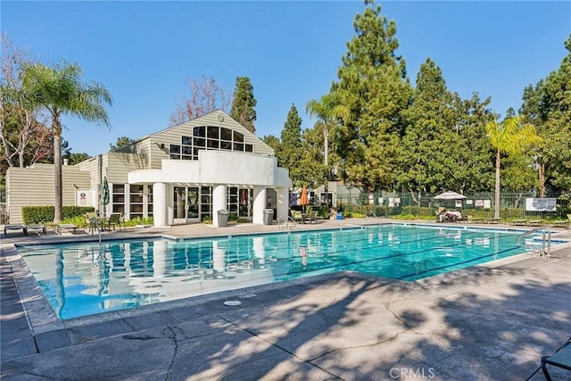 view of pool featuring a patio