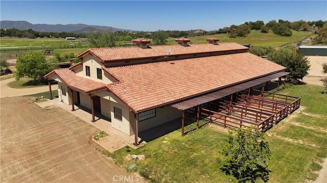 drone / aerial view with a rural view and a mountain view