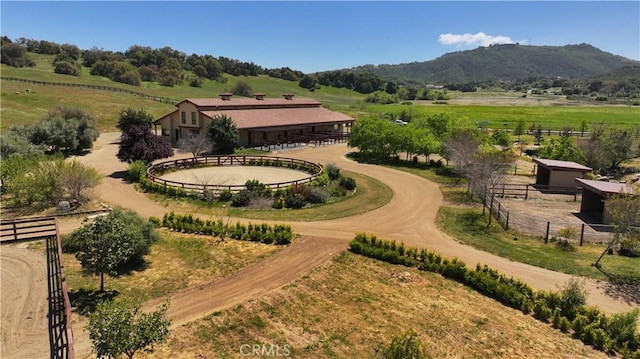 bird's eye view featuring a rural view and a mountain view