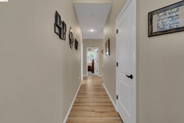 corridor featuring light hardwood / wood-style flooring