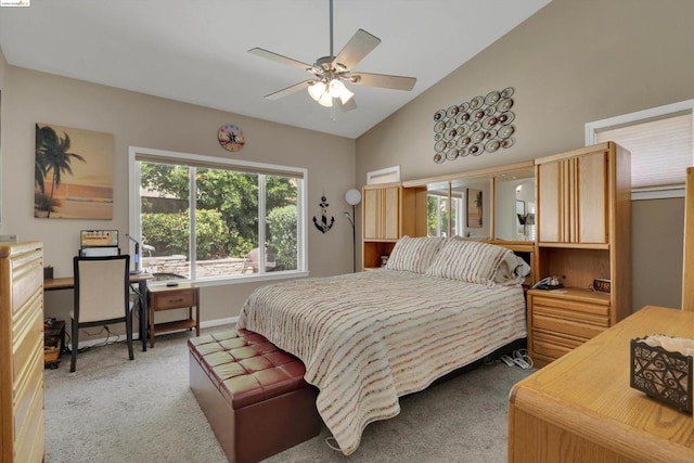 bedroom featuring ceiling fan, carpet floors, and high vaulted ceiling