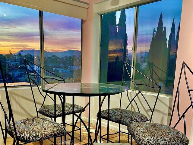 sunroom / solarium with a mountain view