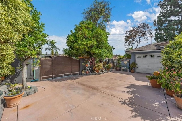 view of patio / terrace featuring a garage