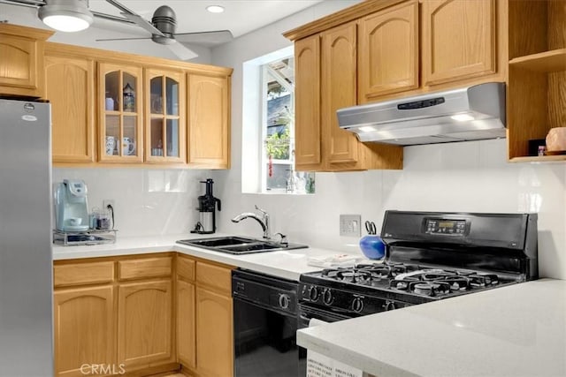 kitchen with sink, light brown cabinets, ceiling fan, and black appliances