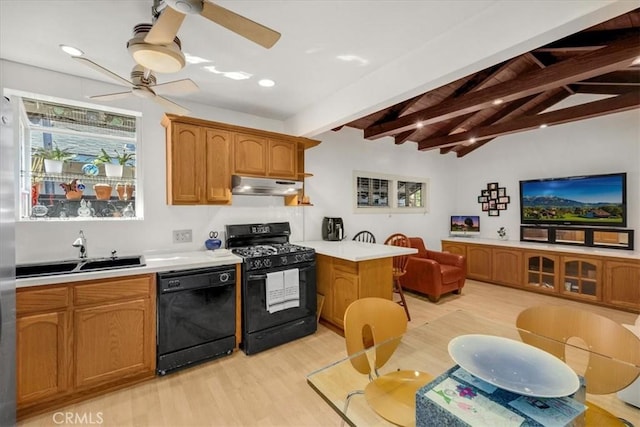 kitchen with sink, lofted ceiling with beams, light hardwood / wood-style flooring, kitchen peninsula, and black appliances