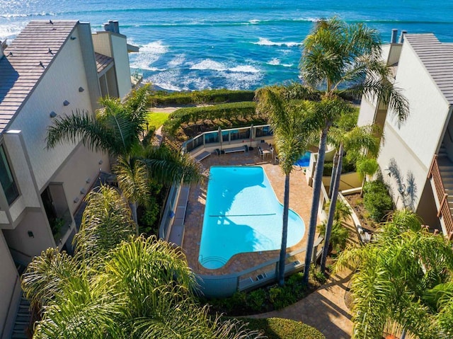 birds eye view of property featuring a water view