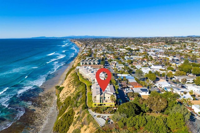 bird's eye view with a beach view and a water view