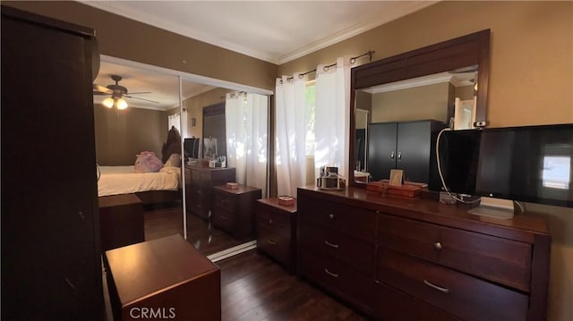 bedroom featuring dark wood-style flooring and crown molding