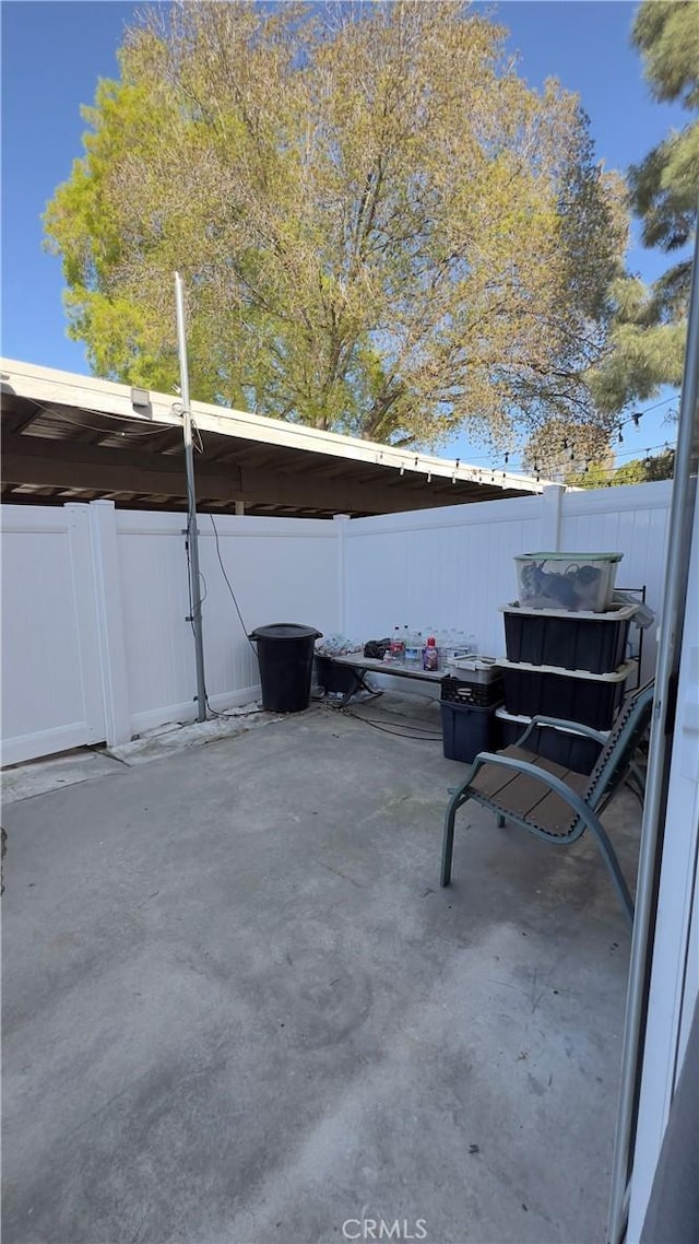 view of patio with a fenced backyard