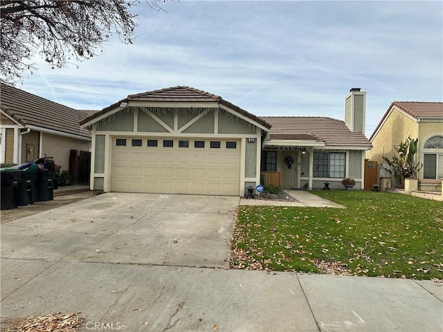 ranch-style home with a front lawn and a garage