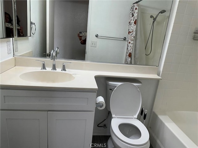 full bathroom featuring toilet, vanity, and shower / tub combo