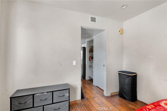 bedroom featuring hardwood / wood-style flooring