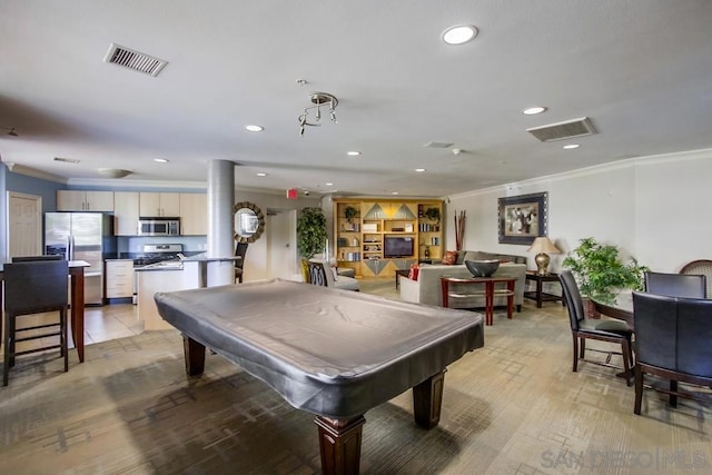 recreation room featuring pool table and ornamental molding