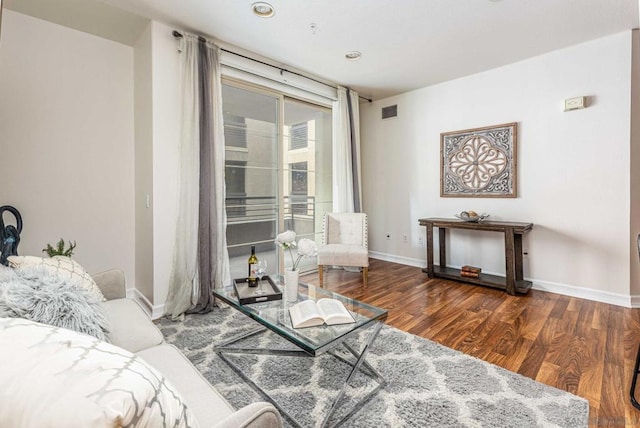 living room featuring dark hardwood / wood-style flooring