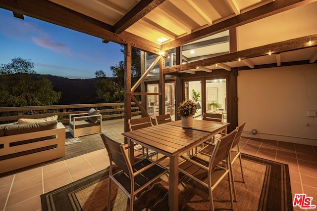 patio terrace at dusk with outdoor lounge area