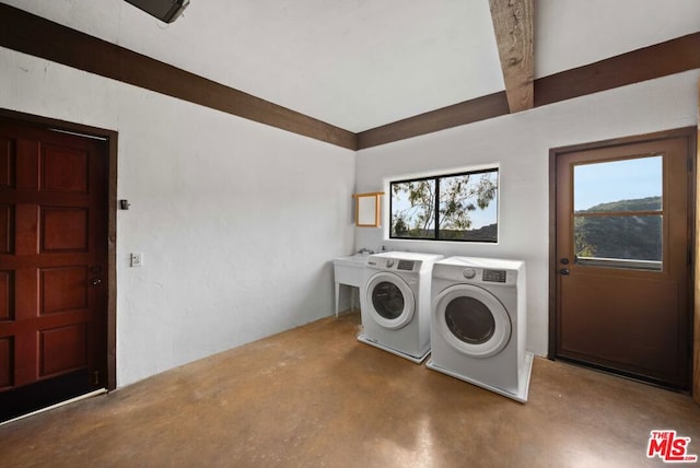 laundry area featuring independent washer and dryer